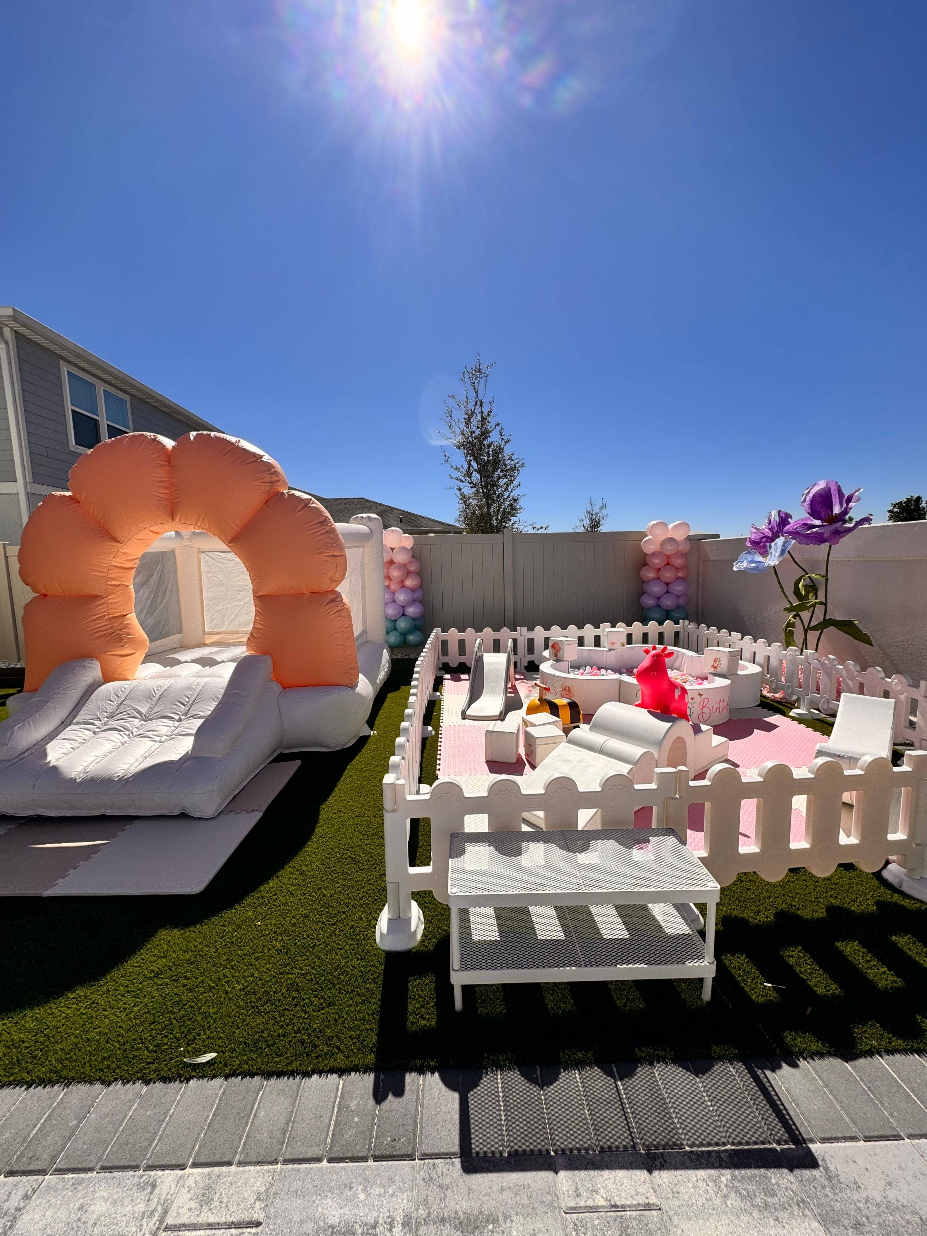 Blush and Bloom Deluxe soft play with peach bounce house and styled play area